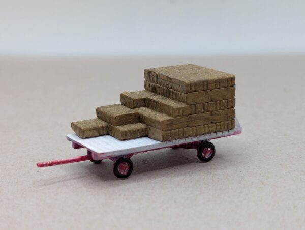 Left side load/unload stack of bales