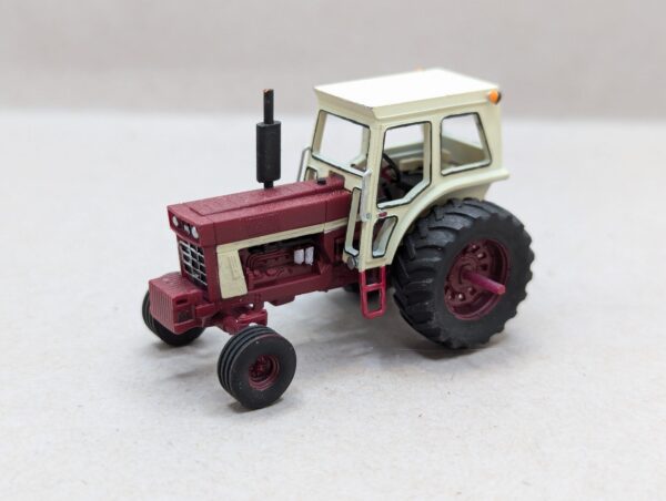 HO Scale Red 66 Tractor With Cab Wide Front