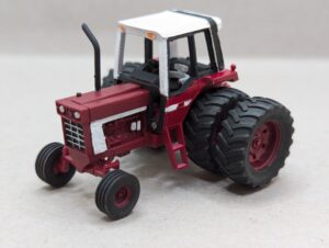 PXL_20260303_040510773 HO Scale Red 86 Series Tractor Wide Front with Duals