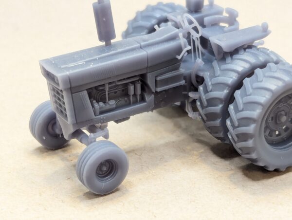 HO Scale Red 66 Tractor With Rops Wide Front with duals