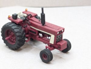 HO Scale Red 66 Tractor With Rops Wide Front